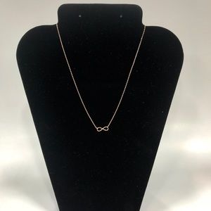 Infinity rose gold tone necklace